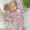 Кукла Тита в розовом свитере