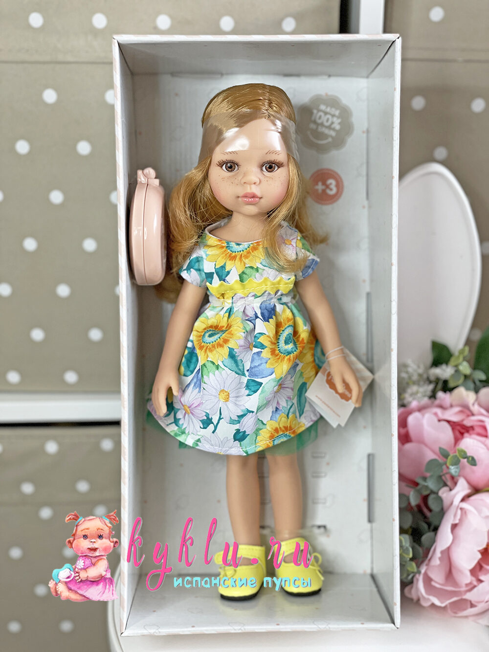 Кукла Даша в ярком платье с цветочным принтом
