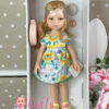 Кукла Даша в ярком платье с цветочным принтом